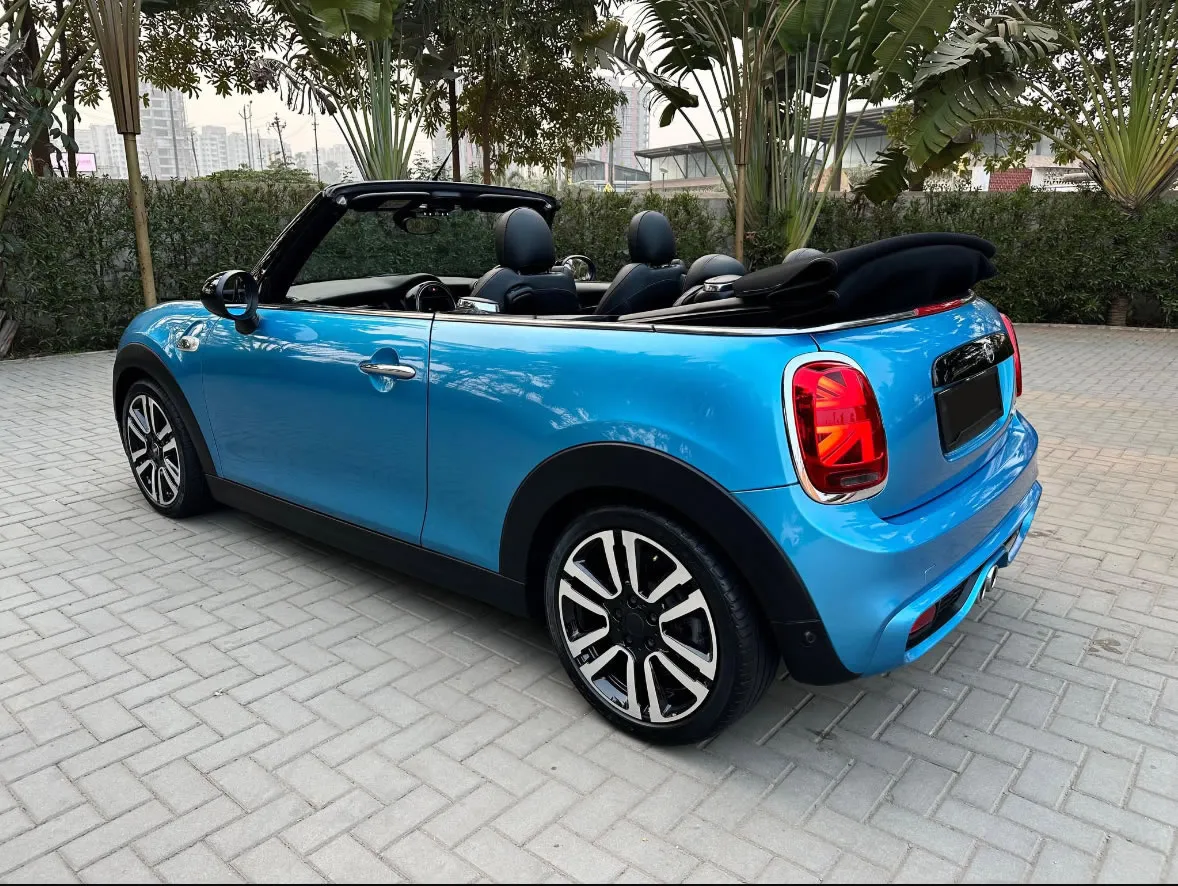 Side profile of the Mini Cooper, a stylish automatic car for rent in Goa.